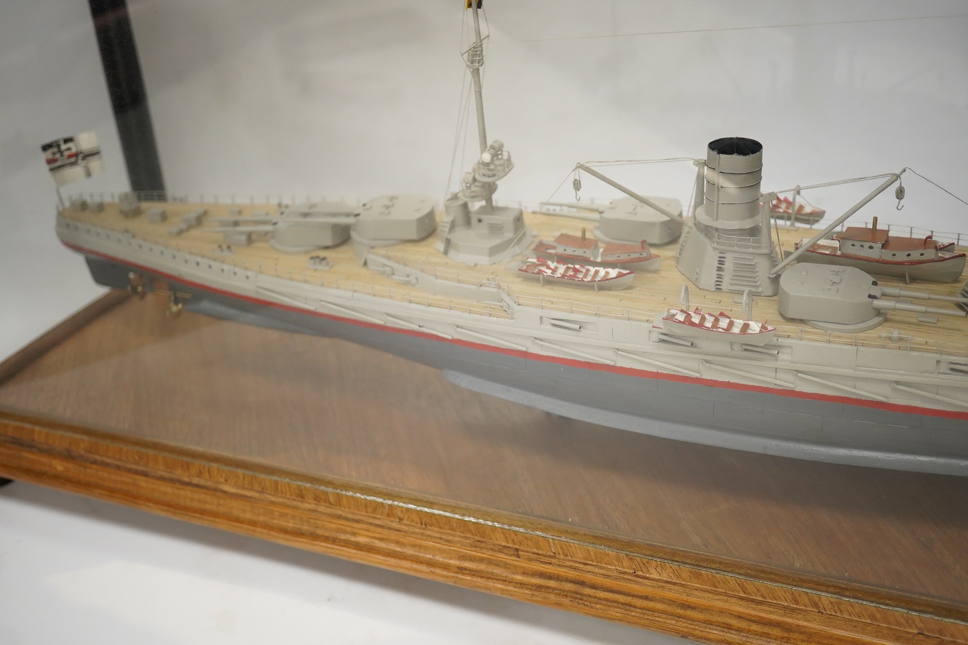 A cased Colin Freeman model of a German battle cruiser, S.M.S. Seydliyz, a well detailed model, with plaque describing the technical details and history regarding her involvement at the battle of Jutland, case 75 x 19.5